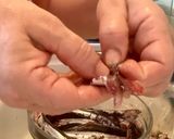 A picture of step 4 of Microwave Marinated Anchovies with Olive Oil, Lemon, Salt, and Pepper.