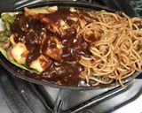 A picture of step 10 of Veg sizzler of sehezwan hakka noodles with sauteed vegetable.