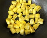 A picture of step 2 of Raw Banana Curry.