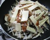 A picture of step 9 of Salmon Cooked In Foil With Creamy Miso and Cheese.