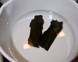 A picture of step 3 of Clear Clam Soup for Doll's Festival or Okuizome (Symbolic First Meal Ritual).