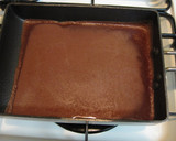 A picture of step 7 of Cocoa Crepe Roll Cake with Whole Strawberries.