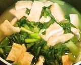 A picture of step 3 of Kyoto-Style Komatsuna Greens and Abura-age (Fried Tofu) in Light Broth.