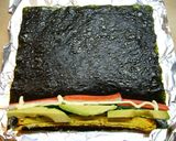 A picture of step 3 of California Roll Made With Aluminum Foil.