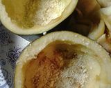 A picture of step 4 of Stuffed eggplant with the trimmings.