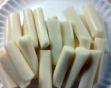 A picture of step 2 of Easy Mozerella Cheese Sticks.