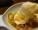 A picture of step 9 of Pork and Kimchi Hot Pot.