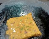 A picture of step 3 of Cheesy Bread Omlette.