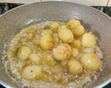 A picture of step 11 of ALOO DUM in WHITE GRAVY...