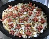 A picture of step 15 of Turnip and Potato Gratin with Mini Pork Sausages.