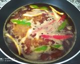 Foto del paso 3 de la receta: Paella con bonito, pimientos y ajos tiernos