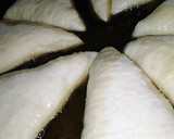 A picture of step 6 of Triangle shaped stuffed bread.
