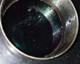A picture of step 3 of Butterfly pea flower syrup.