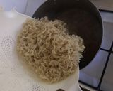 A picture of step 2 of Indomie Noodles.