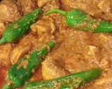 A picture of step 4 of Achar gosht with homemade masala.