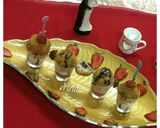 A picture of step 3 of Vermicelli PASTA bombs served with Strawberry custard sauce.