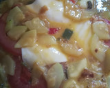 Foto del paso 4 de la receta: Tortilla de calabacín rellena de tomate y queso