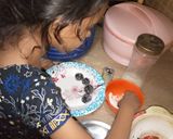 A picture of step 2 of Oreo coconut laddo.