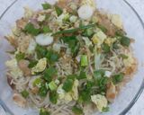 A picture of step 5 of Chicken egg fried rice with noodles.