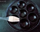 A picture of step 4 of Mini unique delicious soft chocolate lava cake in Appe pan.