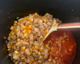 A picture of step 7 of Corn and beans palm oil rice.