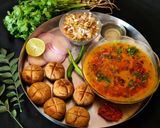 A picture of step 7 of Rajsthani Dal Baati Churma thali (lunch or dinner).