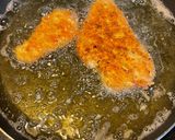 A picture of step 4 of Less saucy chicken Parmesan.