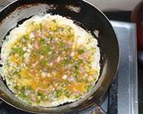 A picture of step 2 of Cheesy Bread Omelette.
