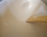 A picture of step 3 of Groundnut and coconut pap.