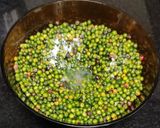 A picture of step 3 of Green peppercorn pickle.