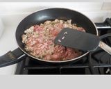 Foto del paso 3 de la receta Berenjenas rellenas y gratinadas con huevo y queso rallado
