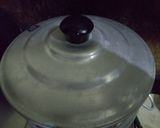 A picture of step 33 of Poush pitha thali.