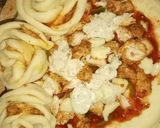 A picture of step 17 of Chicken Malai boti creamy floral pizza in pateela.