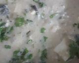 A picture of step 7 of Nawabi Paneer Restaurant style paneer in white gravy.