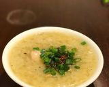 A picture of step 7 of Chicken Arroz Caldo.