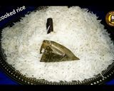 A picture of step 7 of Delhi's layered chicken Dum Biryani.
