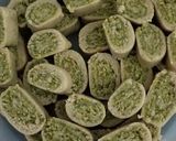 A picture of step 4 of Kaju pistachio roll.