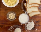 Foto langkah ke 1 dari resep Almond cheese toast.
