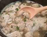 A picture of step 2 of Thai-style omelette soup with pork balls.