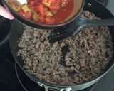 A picture of step 2 of Hot & Spicy Sausage Dip.