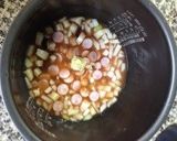 A picture of step 2 of Easy Ketchup Rice (for Omurice) in a Rice Cooker.