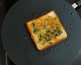 A picture of step 7 of Domino's style cheesy Garlic Bread.