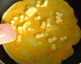 A picture of step 6 of Stir Fried Udon Noodles with Melting Cheese and Fluffy Eggs.