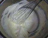 A picture of step 10 of Cocoa Crepe Roll Cake with Whole Strawberries.