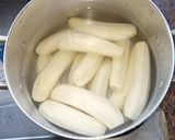 A picture of step 1 of Salt boiled green bananas for breakfast.