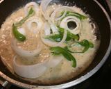 A picture of step 2 of Smothered Pork Chops.