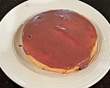 A picture of step 10 of Vanilla Chip Layer Cake with Cherry Curd Filling.