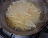 A picture of step 4 of KFC STYLE CRUNCHY FRENCH FRIES😋.