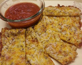 A picture of step 12 of Cauliflower Cheese "Breadsticks".