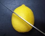 A picture of step 1 of How To Cut Lemon Wedges.